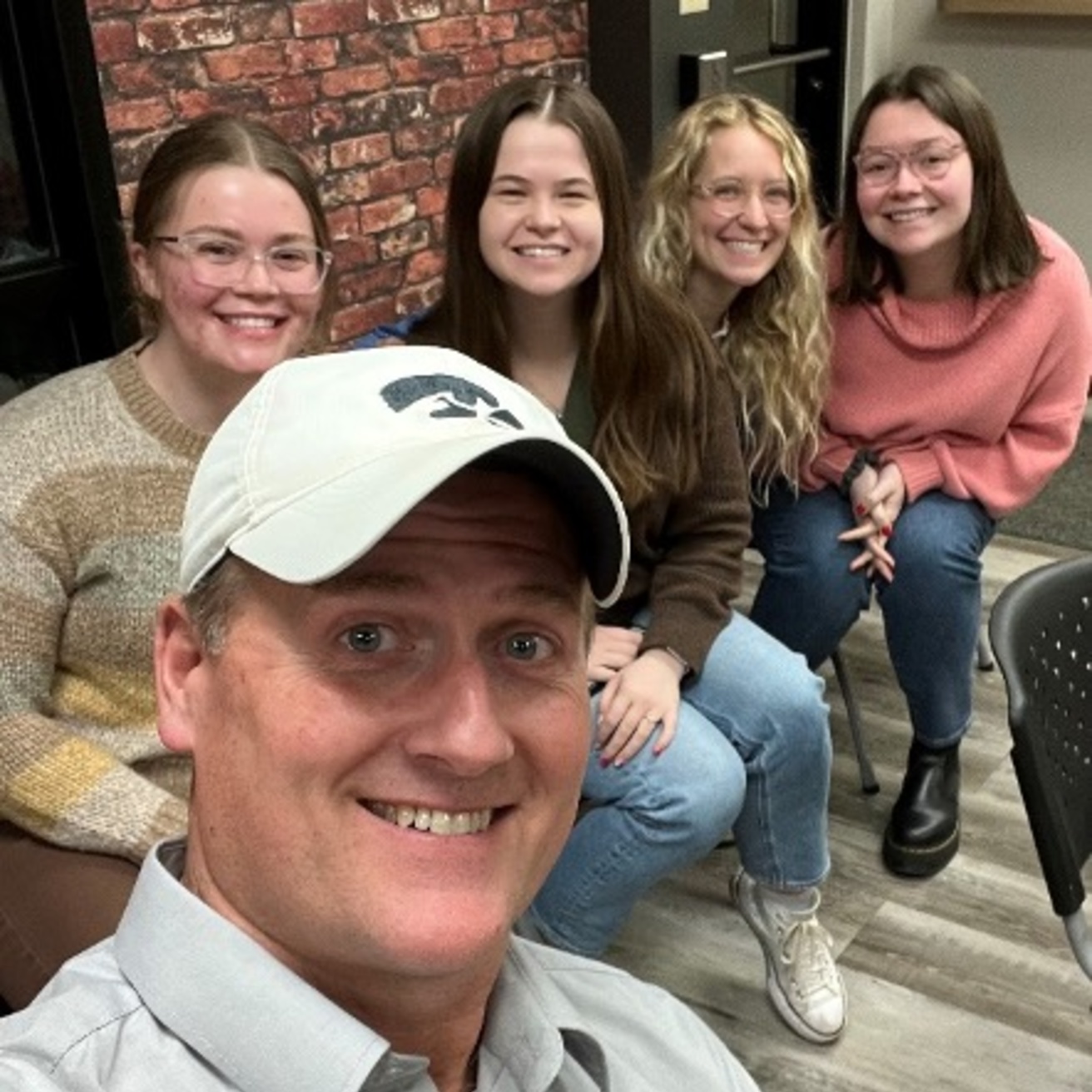 Craig Just taking selfie with 4 students